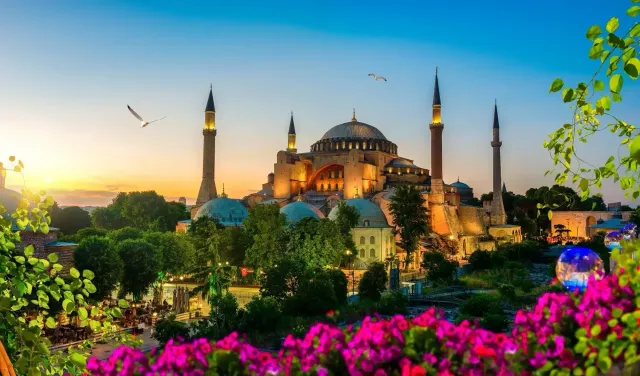 Golden light filling the vast central dome of Hagia Sophia