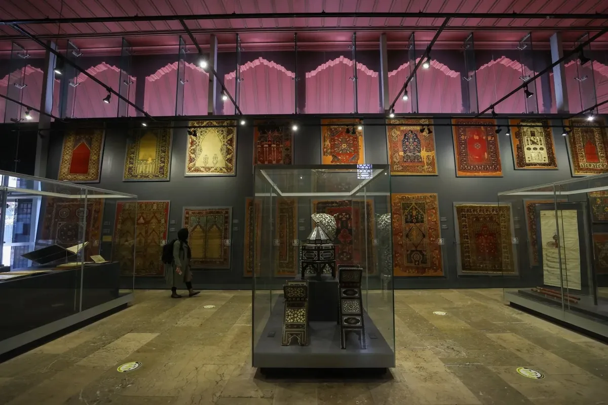Antique Ottoman carpets displayed on the walls of the Turkish and Islamic Arts Museum